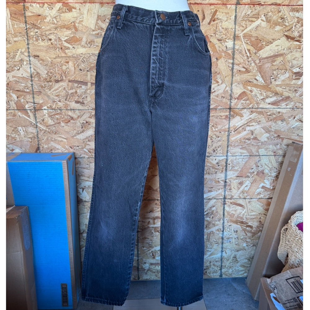 Faded distressed black vintage 90s Wrangler high-waisted straight-leg jeans